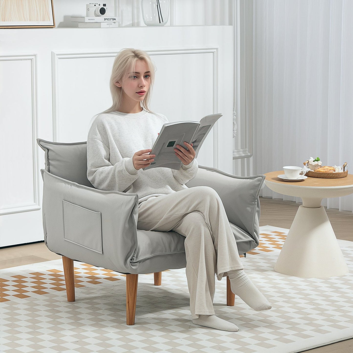 Adjustable light gray upholstered armchair with cushion