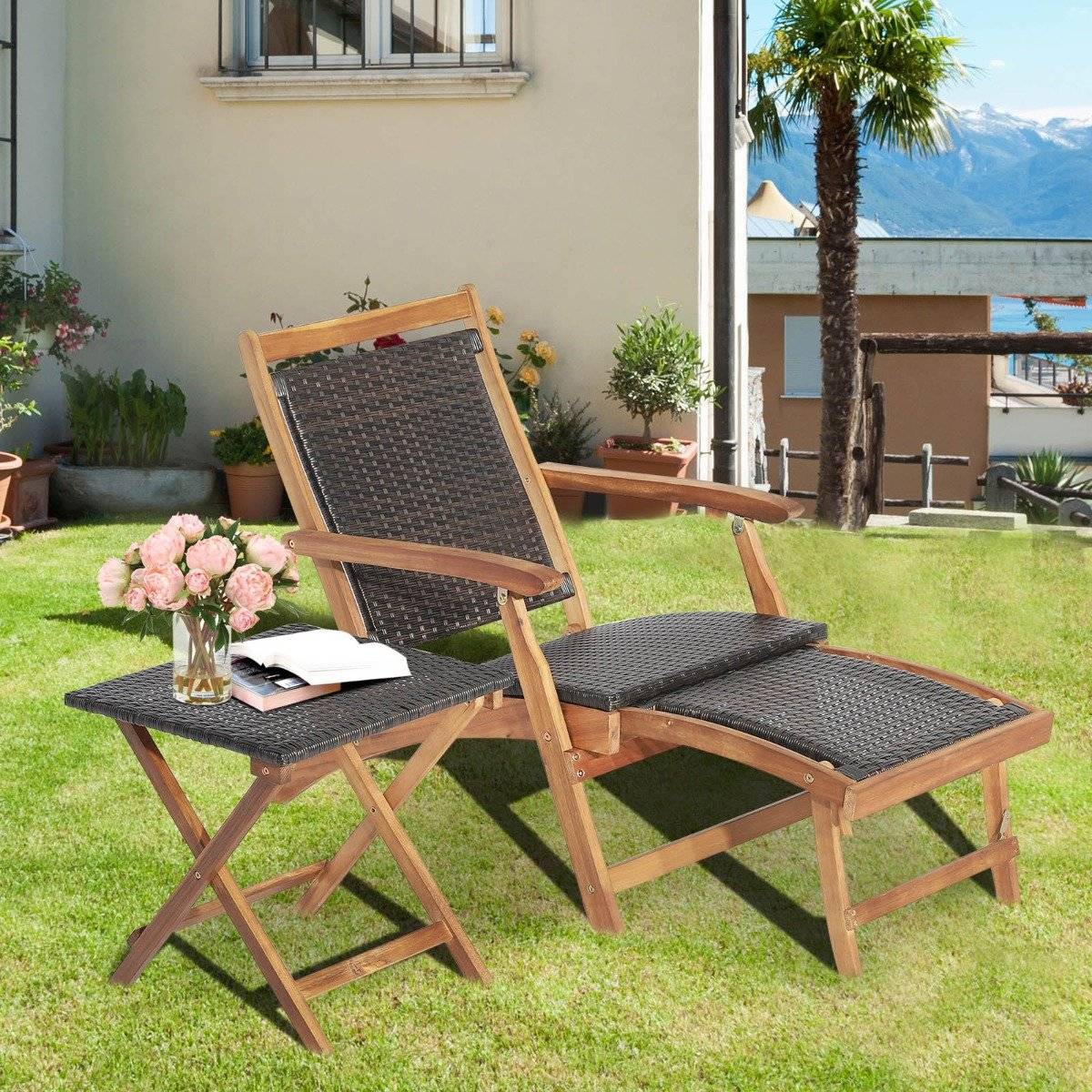 2-piece garden furniture set consisting of a chair with extendable footrest and side table made of brown acacia wood