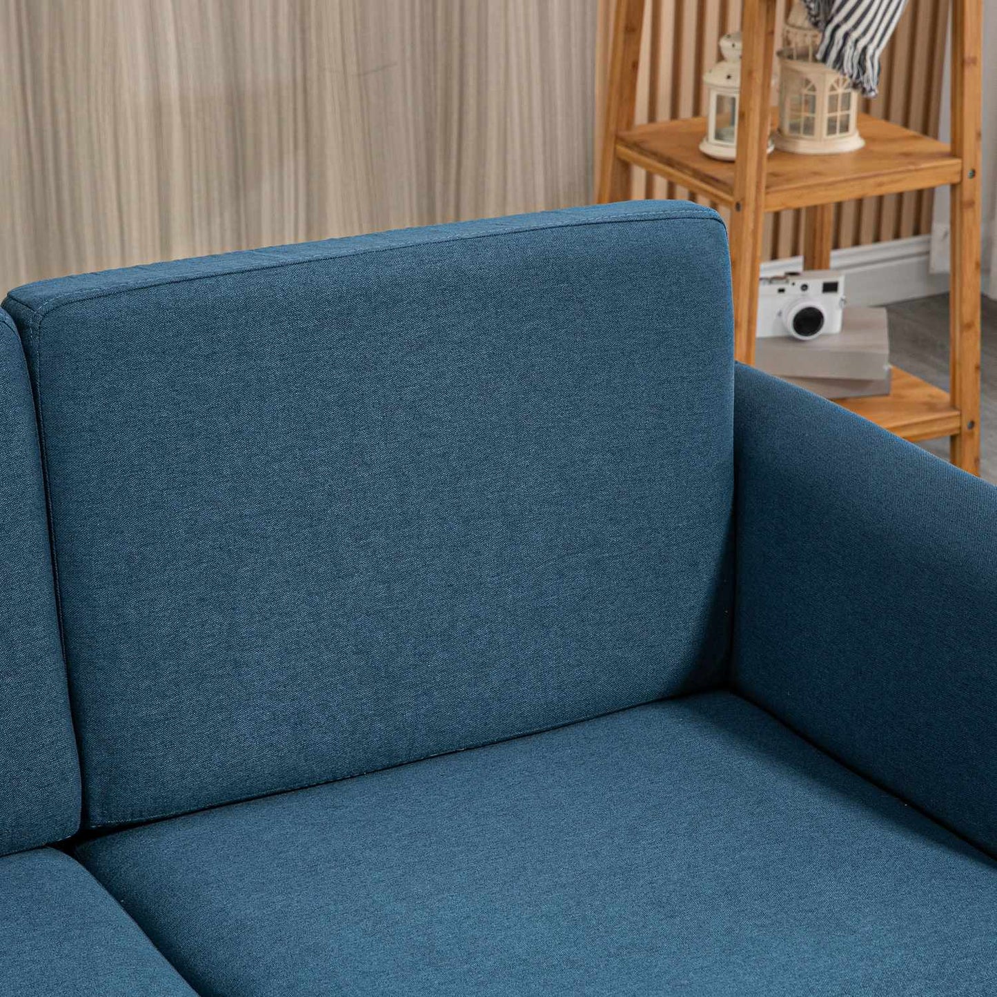 2-seater blue linen sofa with wooden legs, padded upholstery