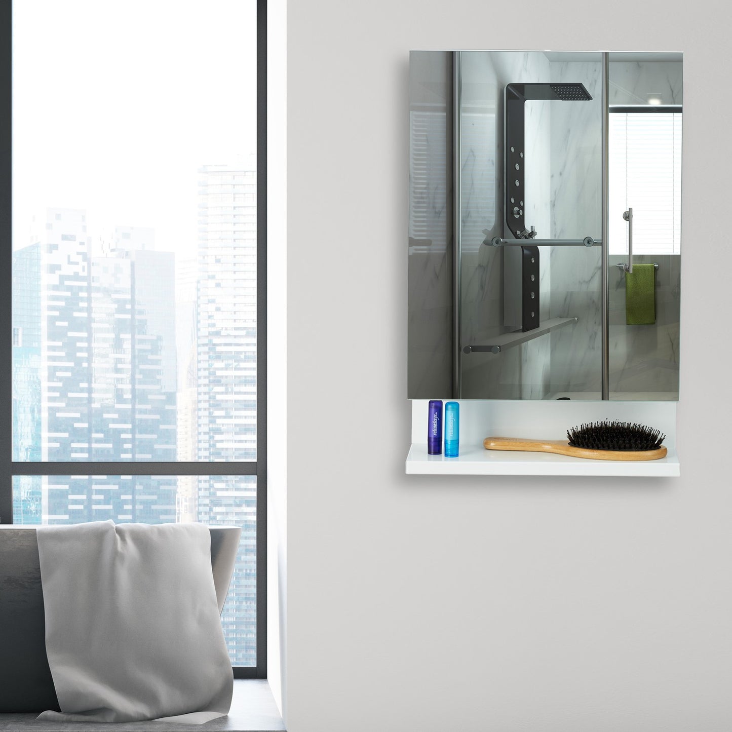 Bathroom mirror cabinet with outlet