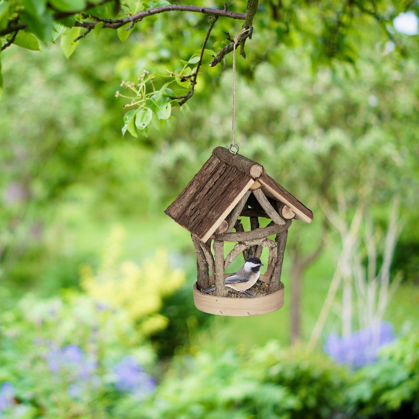 Bird feeding station for outdoors