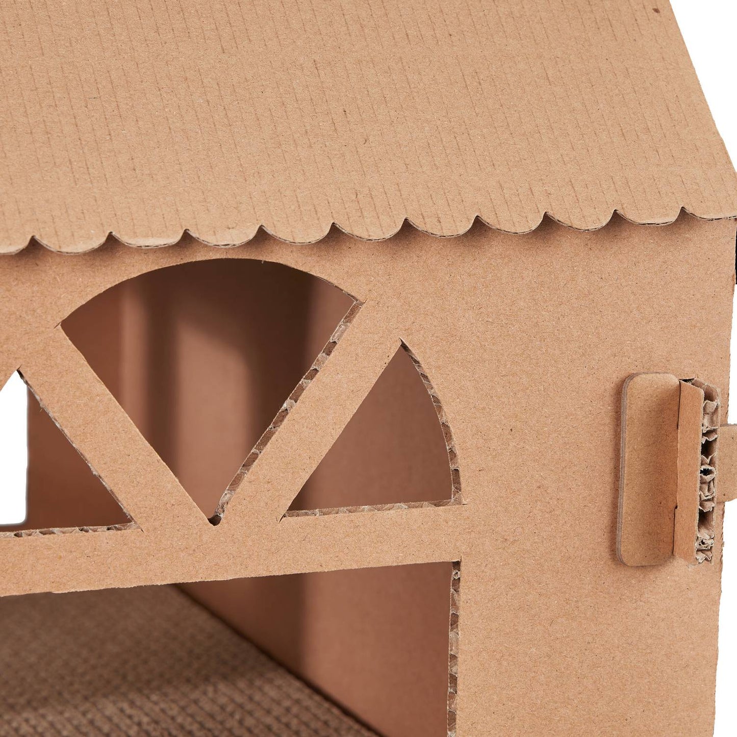 Cardboard cat house with scratching board