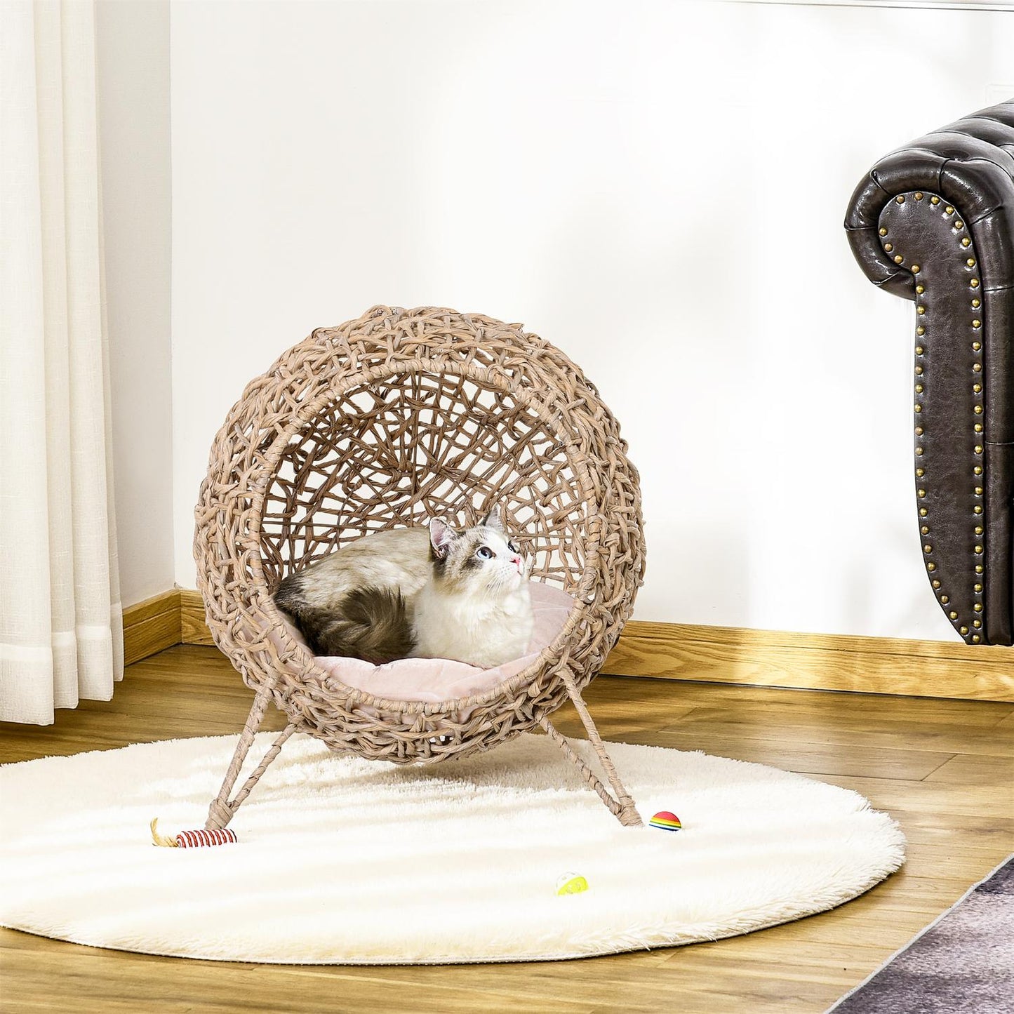 Natural PE rattan house with cushions, raised feet