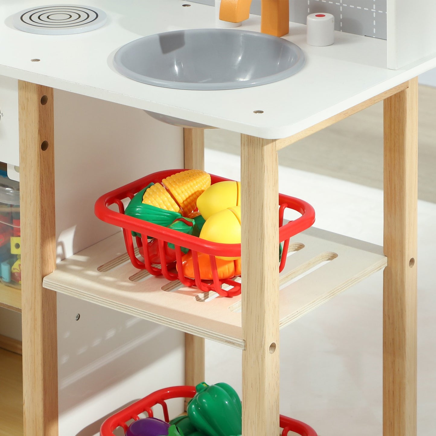 Gray play kitchen set for children with stove, sink and accessories