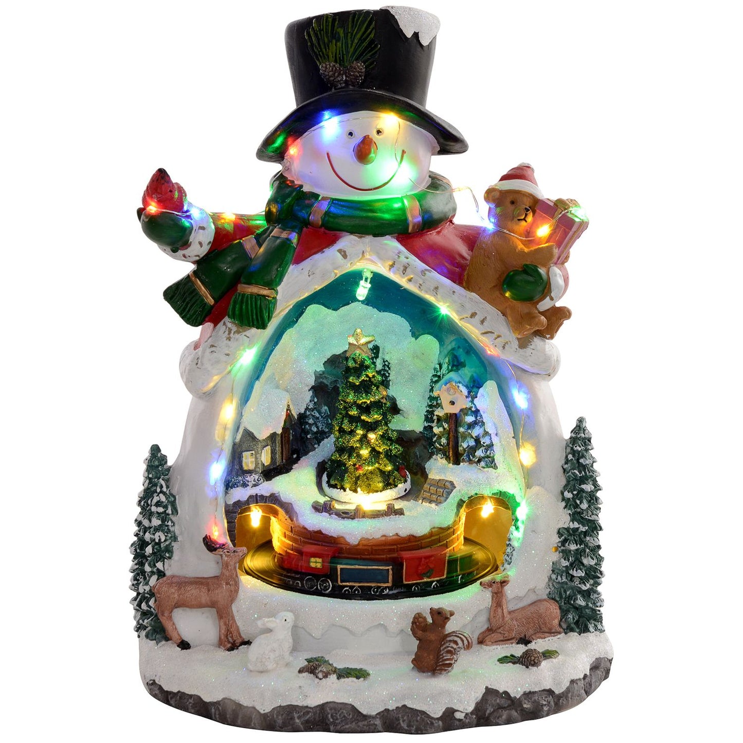 Christmas village with LED lights, music and trains