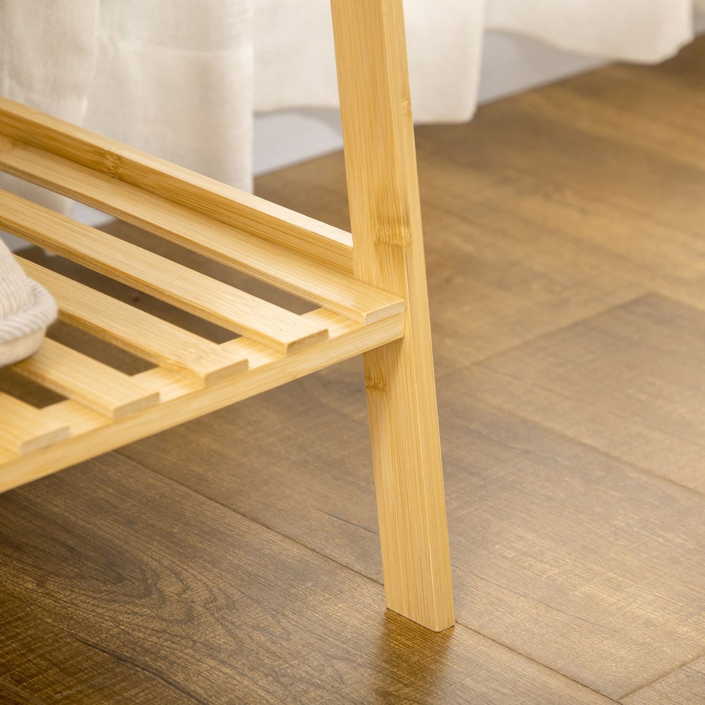 Bamboo clothes rack with shelves and hooks, natural wood