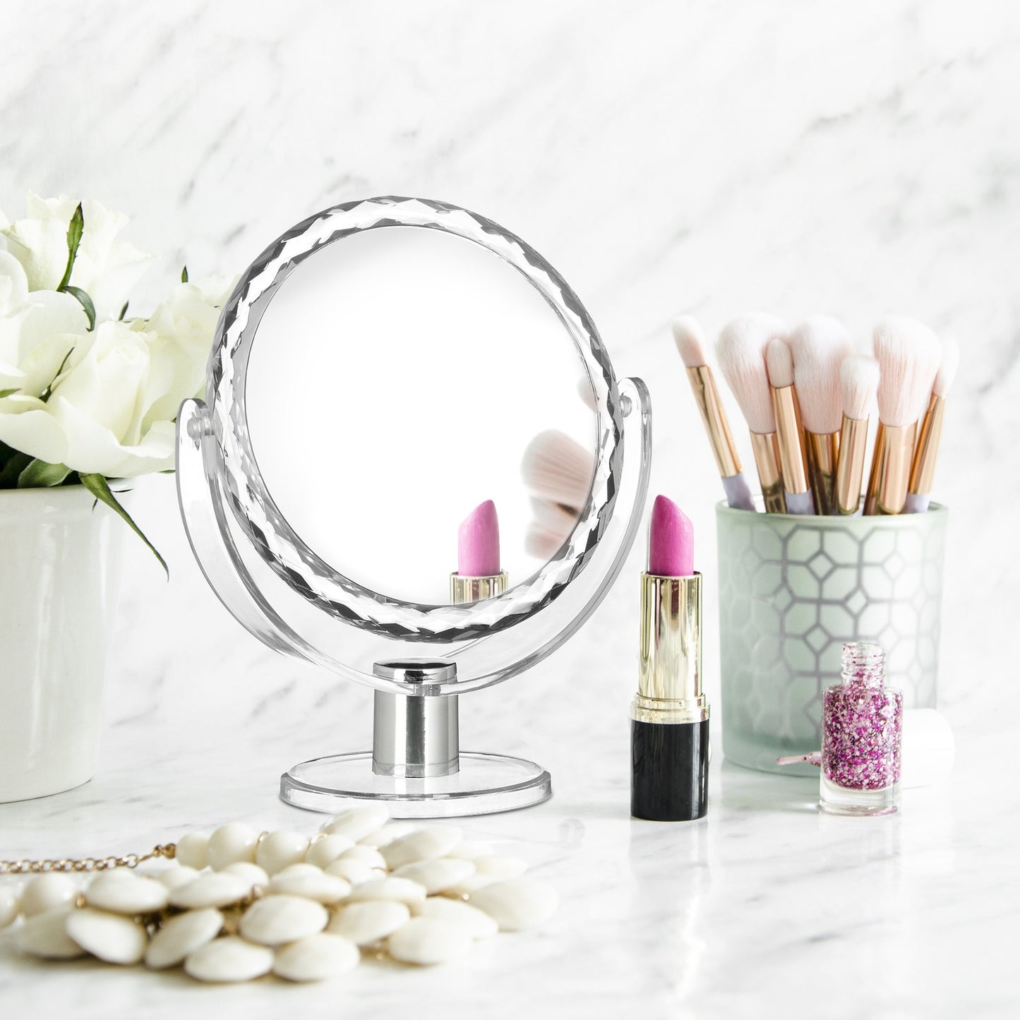 Cosmetic mirror with magnification standing