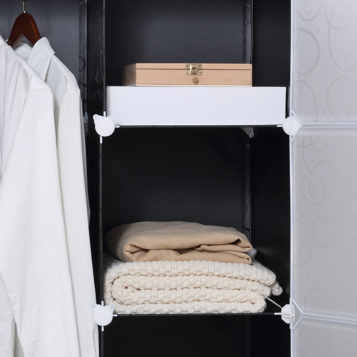 Modular wardrobe shelving system with 11 cubes, black