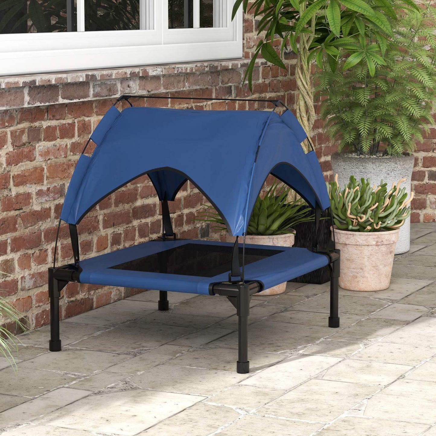 Raised outdoor dog bed with breathable roof