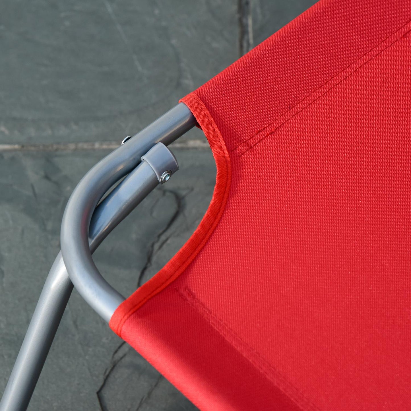 Red folding sun lounger, adjustable metal backrest