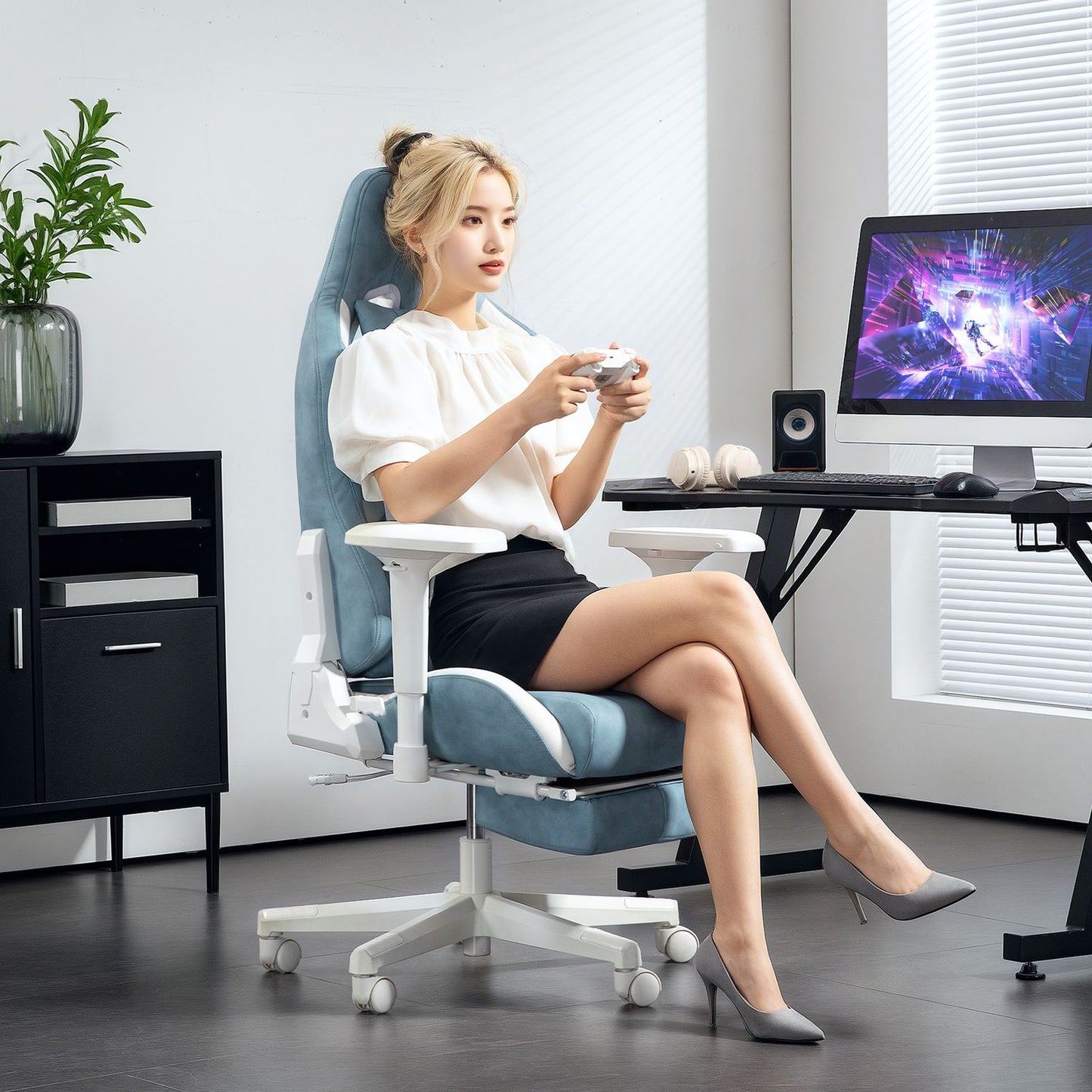 Blue Ergonomic gaming chair, reclining with footrest and cushions