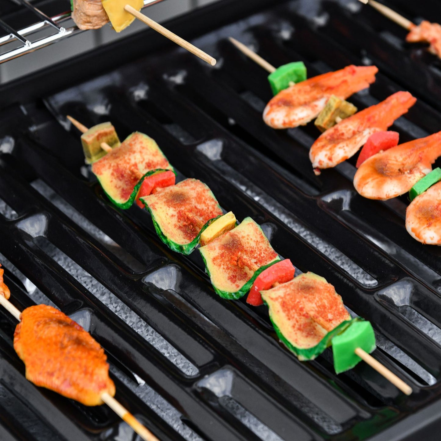 Gas grill with 6 burners, side burner, storage cabinet