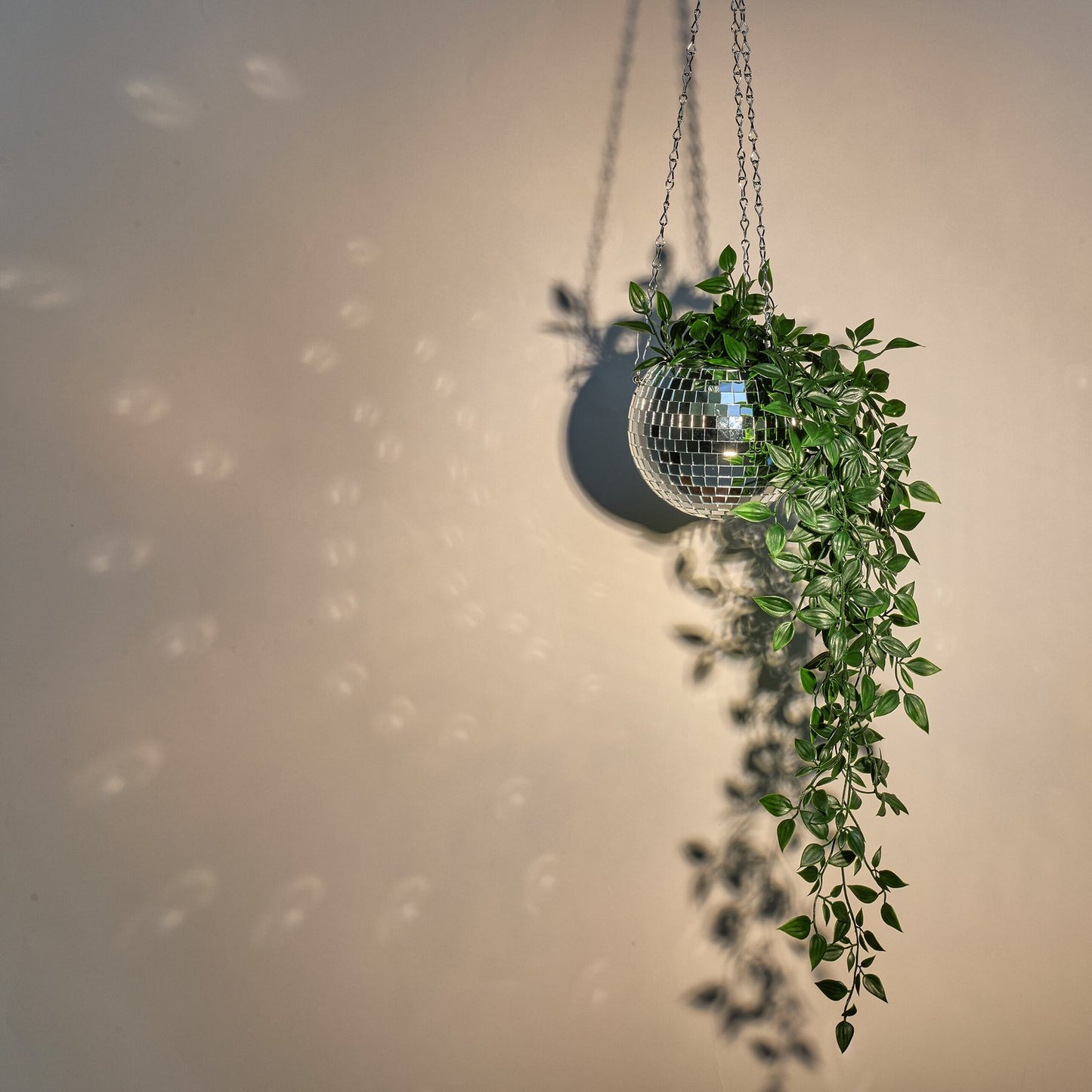 Hanging flower pot with disco ball