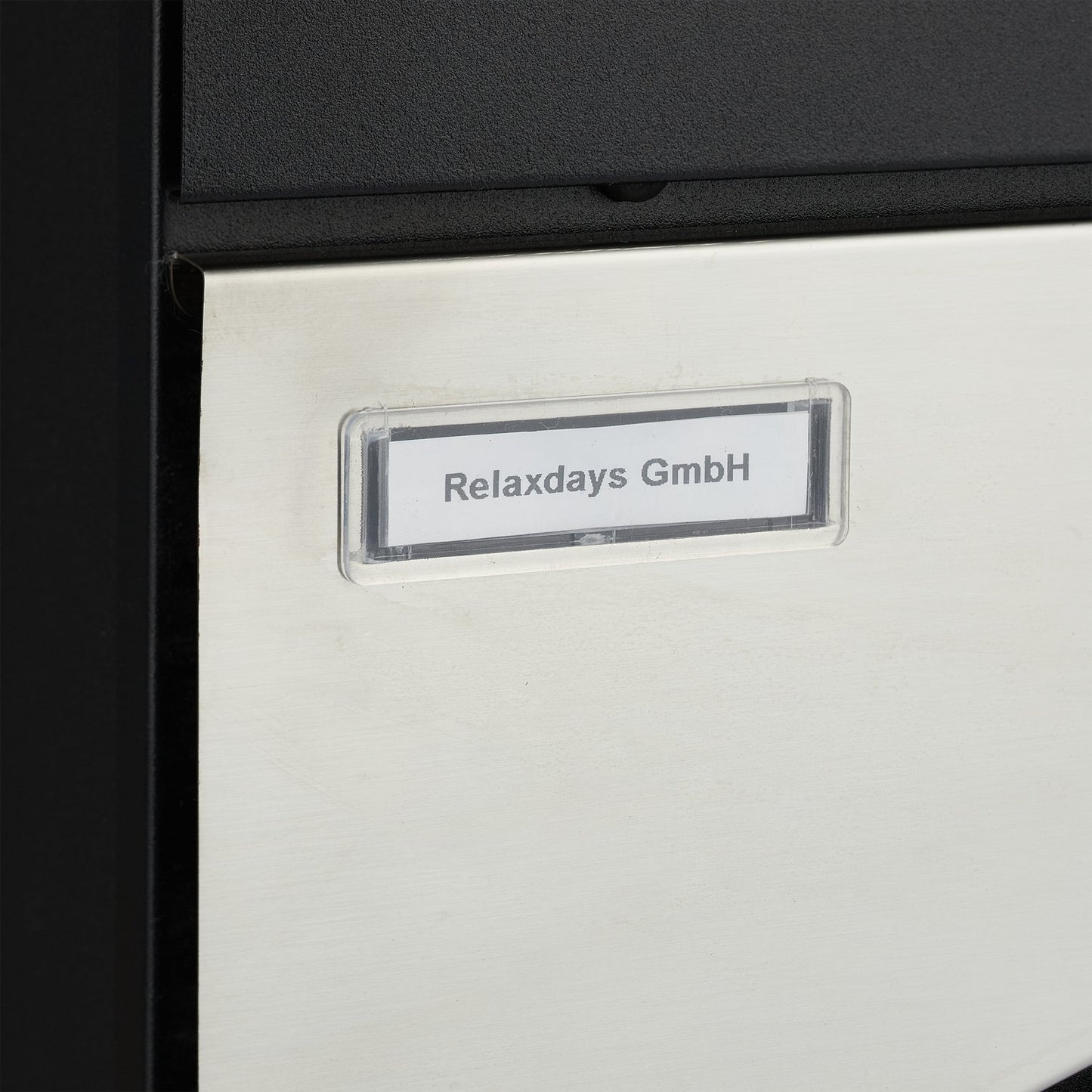 Letterbox with newspaper holder