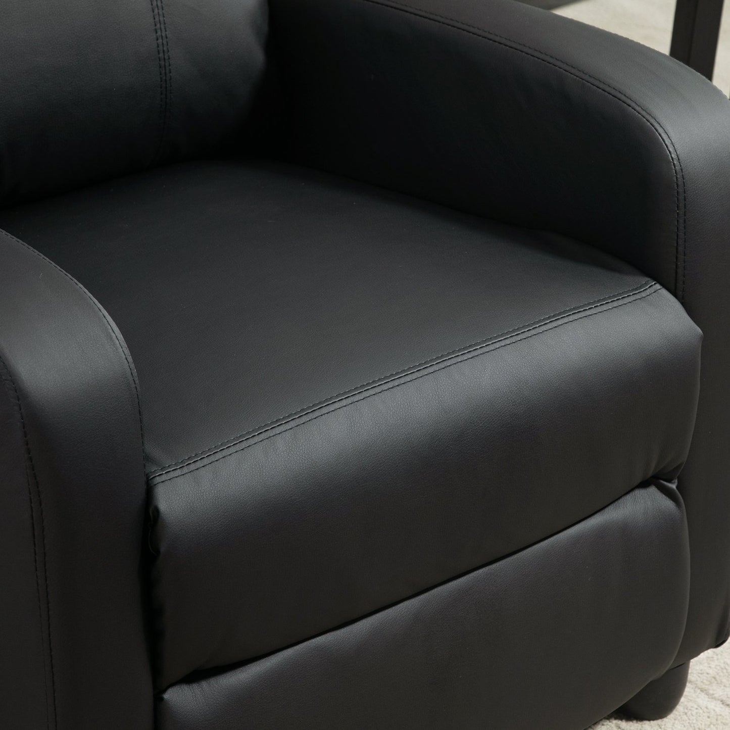 Reclining massage and relaxation chair, black PU foam
