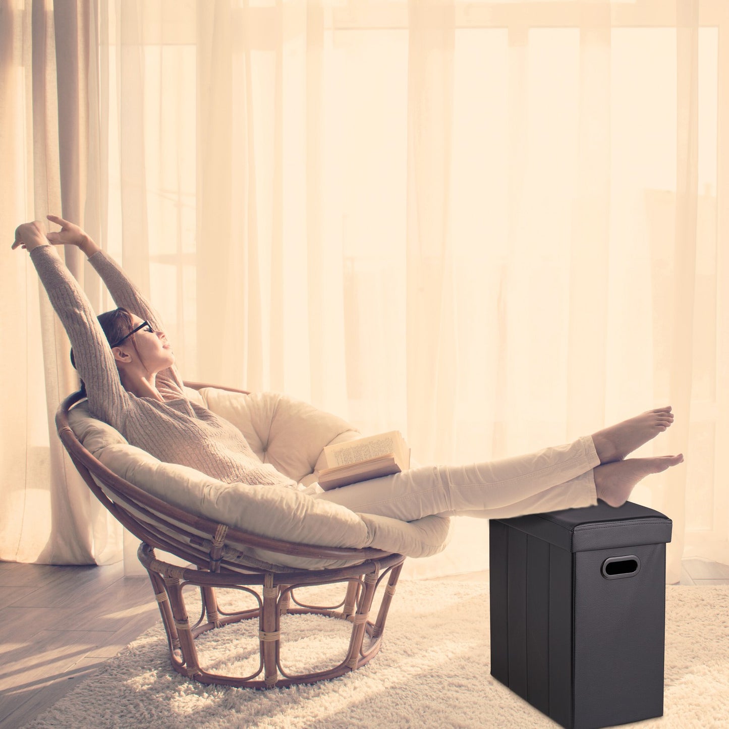 Ottoman in black artificial leather