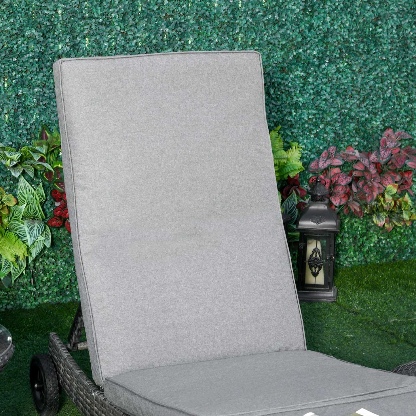 Adjustable sun lounger in poly rattan with cushion, grey