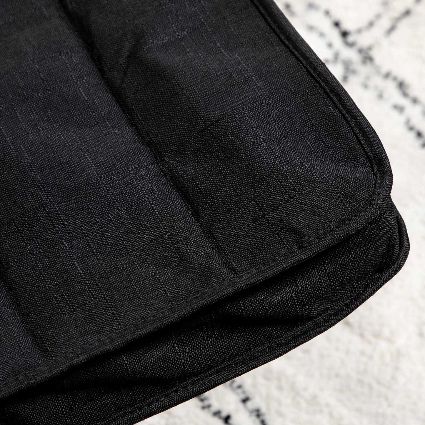 Relaxation chair with adjustable footrest, linen, black