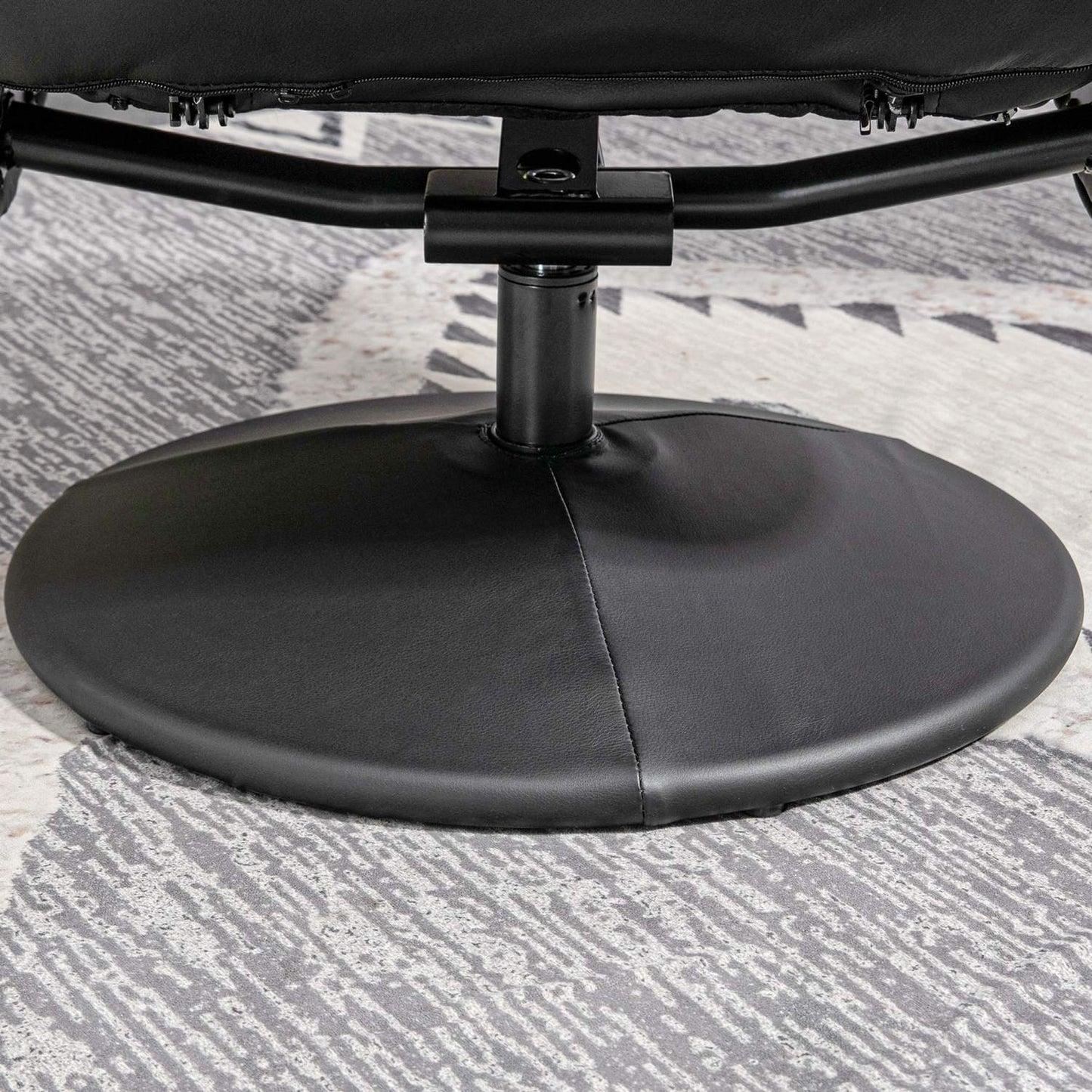 Black reclining swivel chair in artificial leather with stool