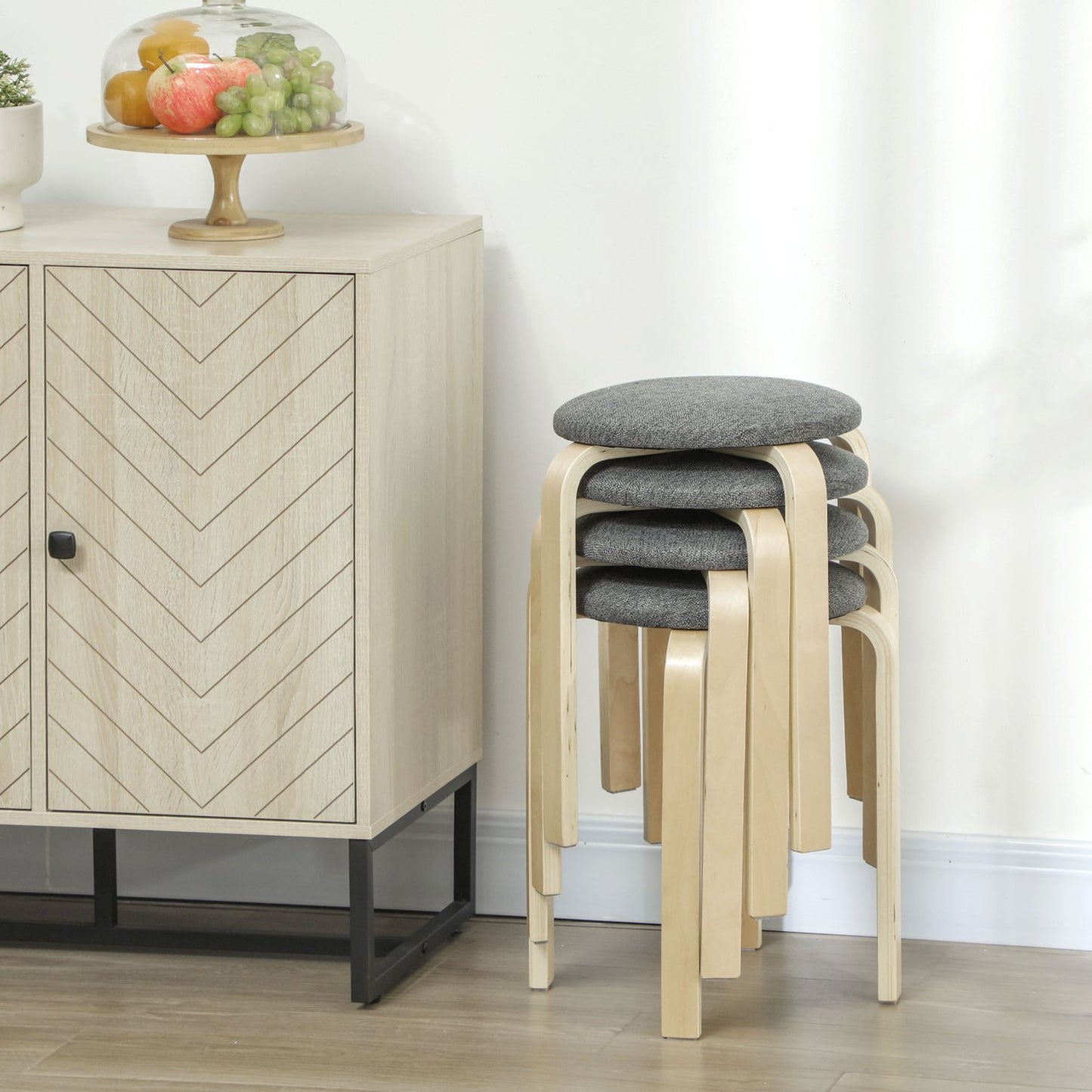 Set of 4 stackable upholstered stools, lacquered surface, wooden legs, grey