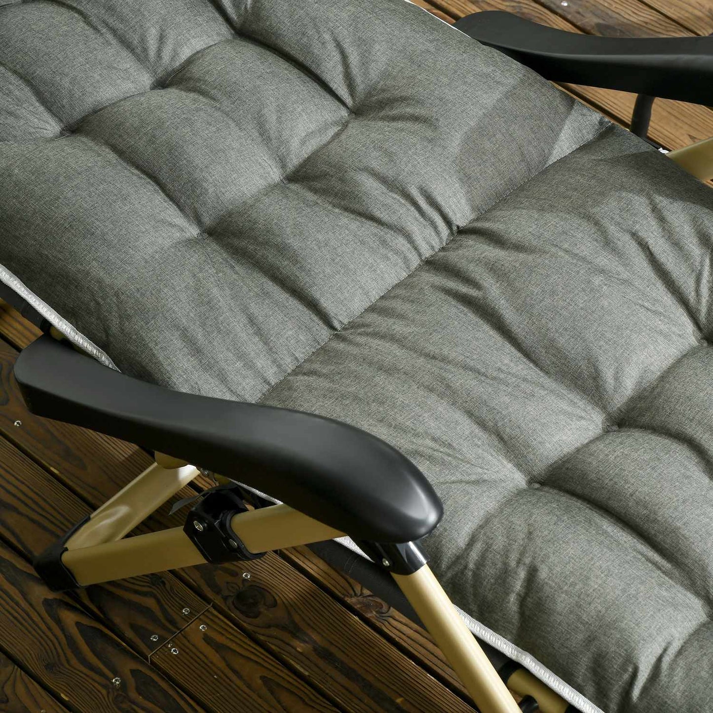 Folding sun lounger with adjustable backrest and cushion