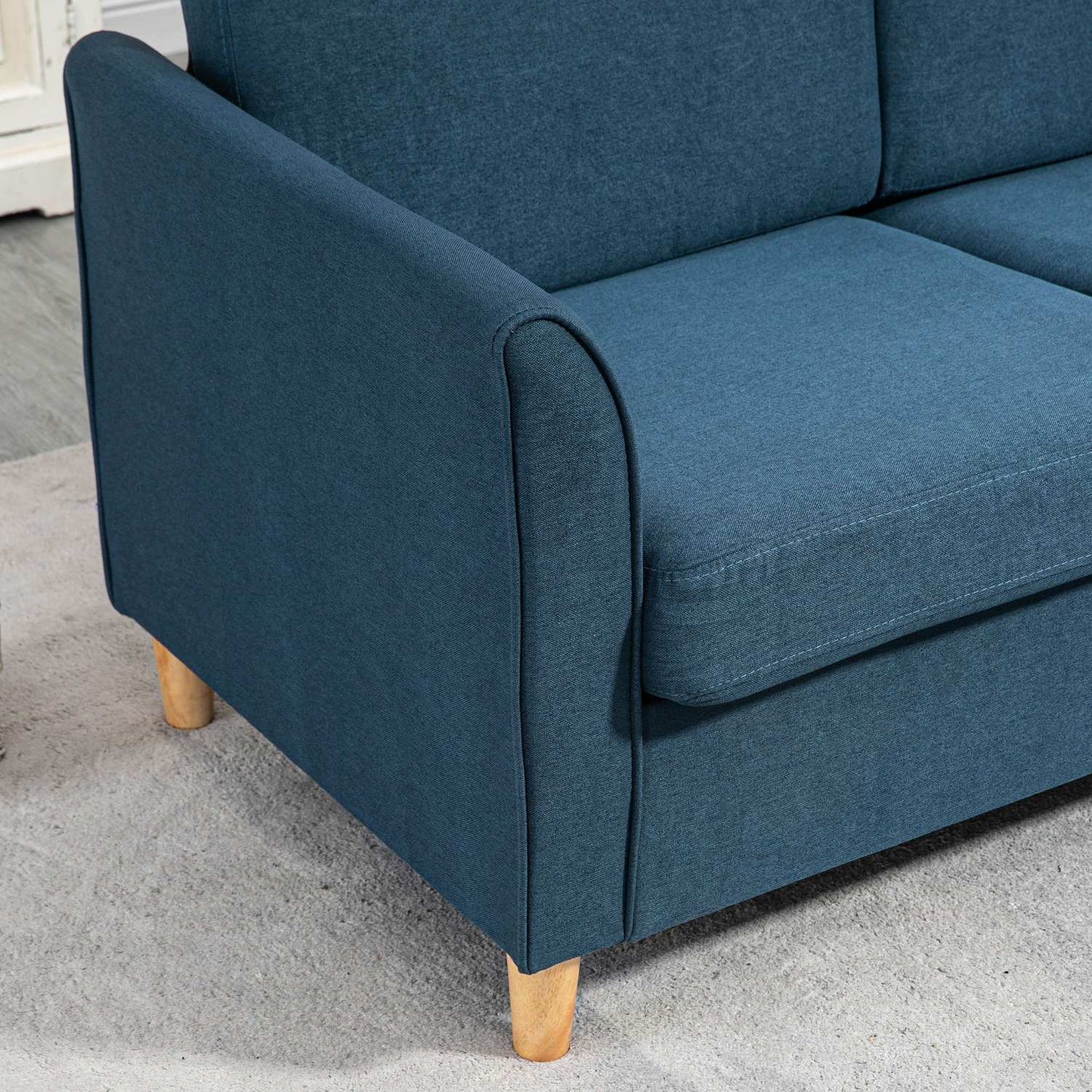2-seater blue linen sofa with wooden legs, padded upholstery