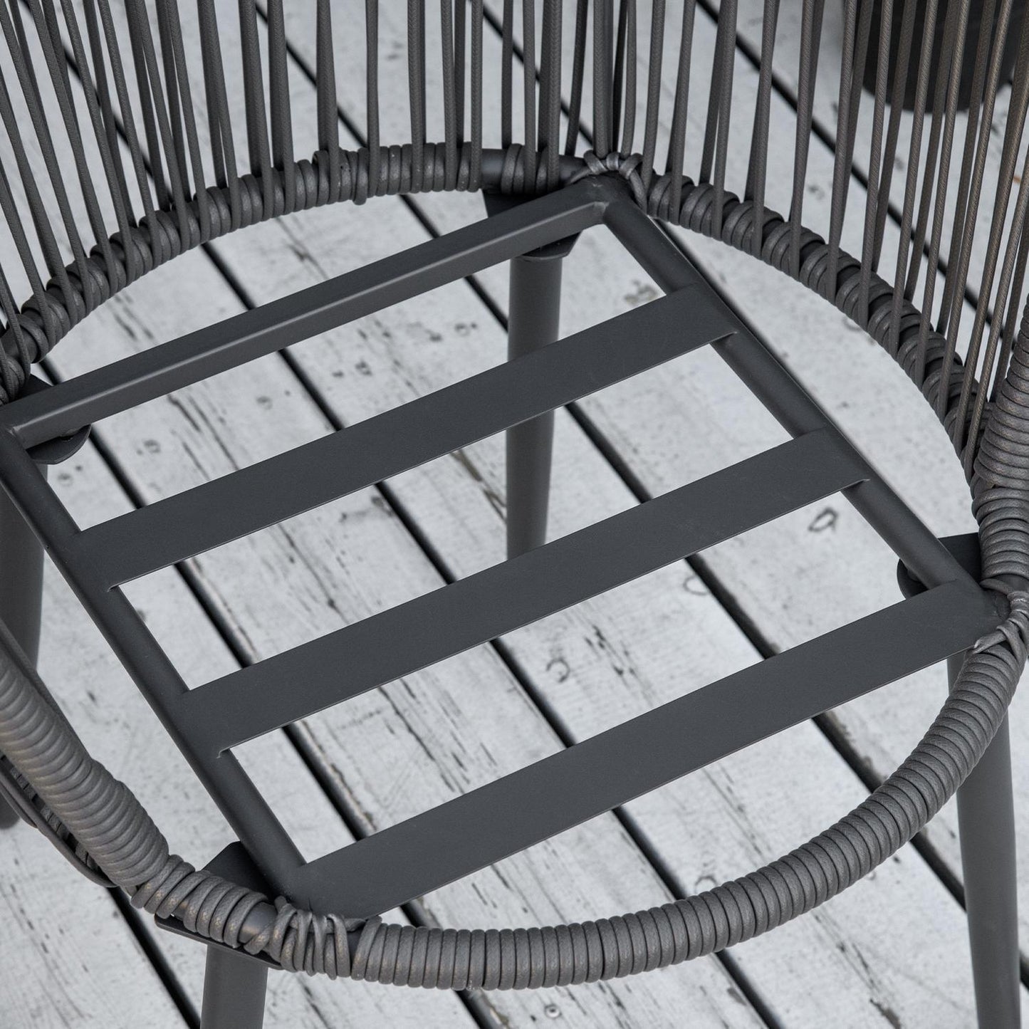 Rattan garden furniture - 2 chairs and table, cushions included