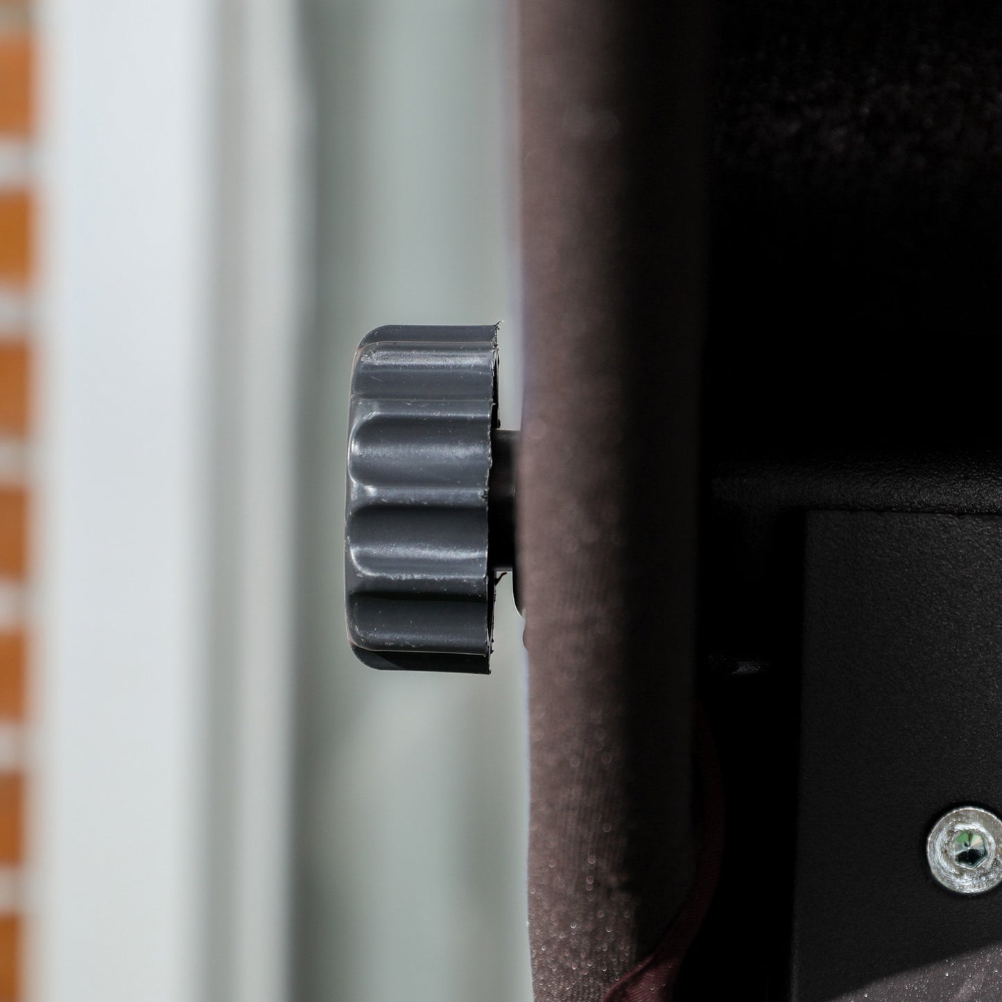 3-seat rocking bench in metal with cushion and adjustable canopy