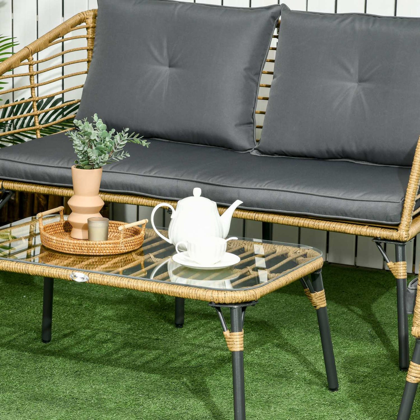 4-piece garden furniture in rattan, cushions included