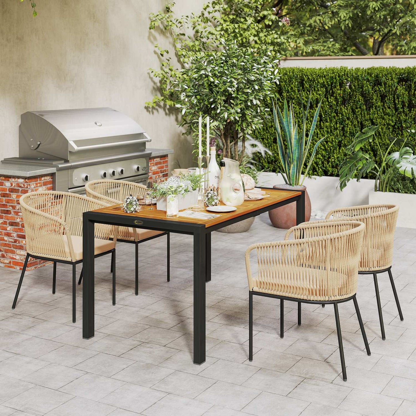 Patio set in poly rattan for 4 with table and cushions