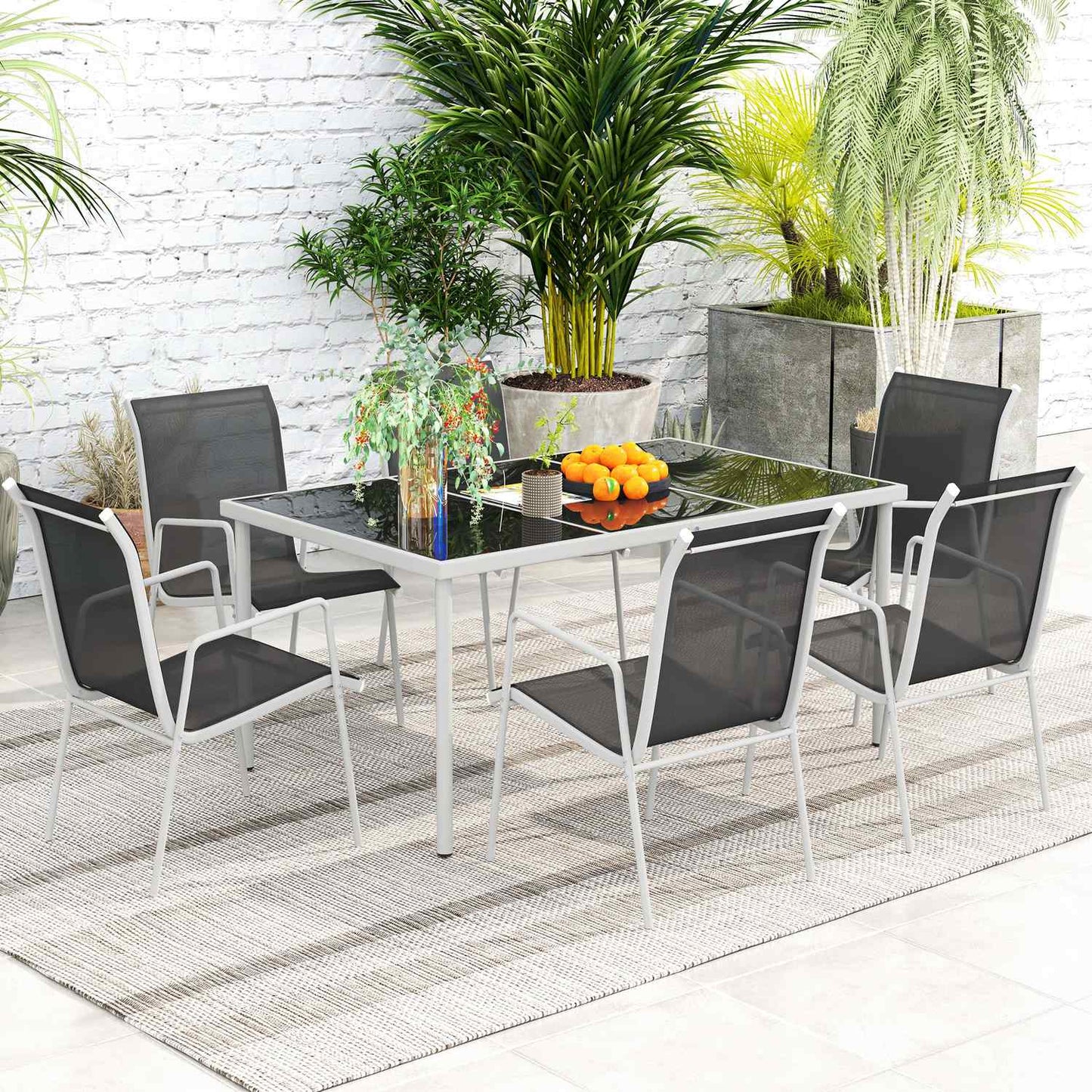 Dining room set for 6 with glass table and stackable chairs