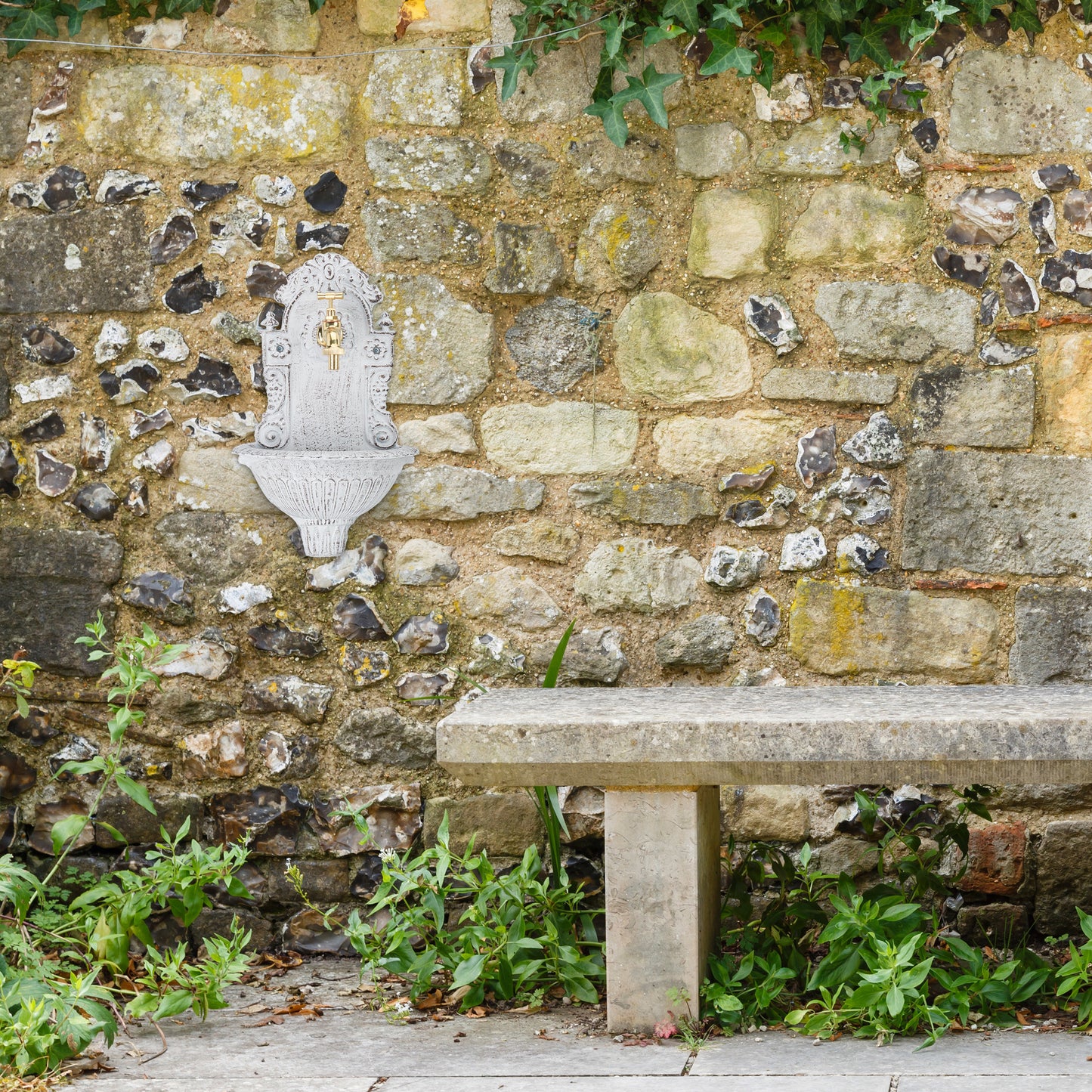 Wall fountain in antique style