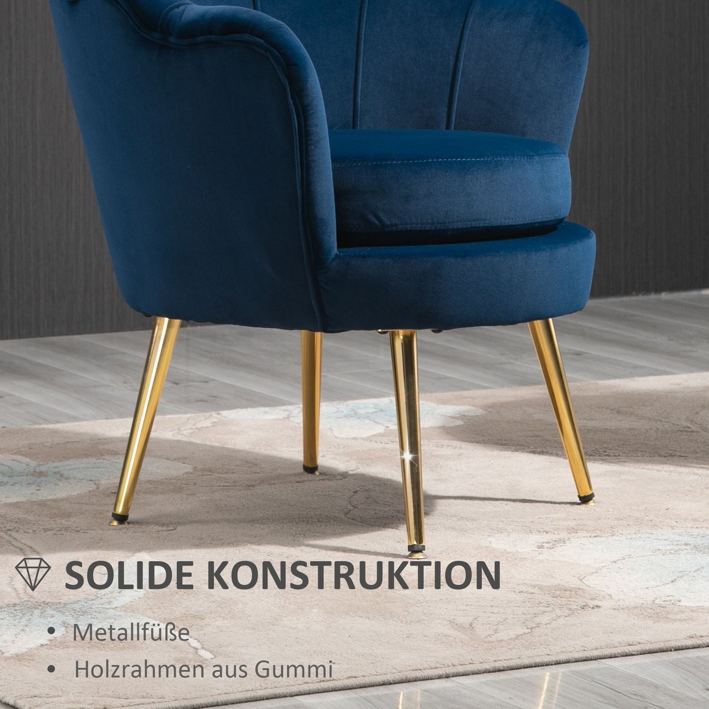 Blue shell-shaped upholstered velvet armchair with metal legs