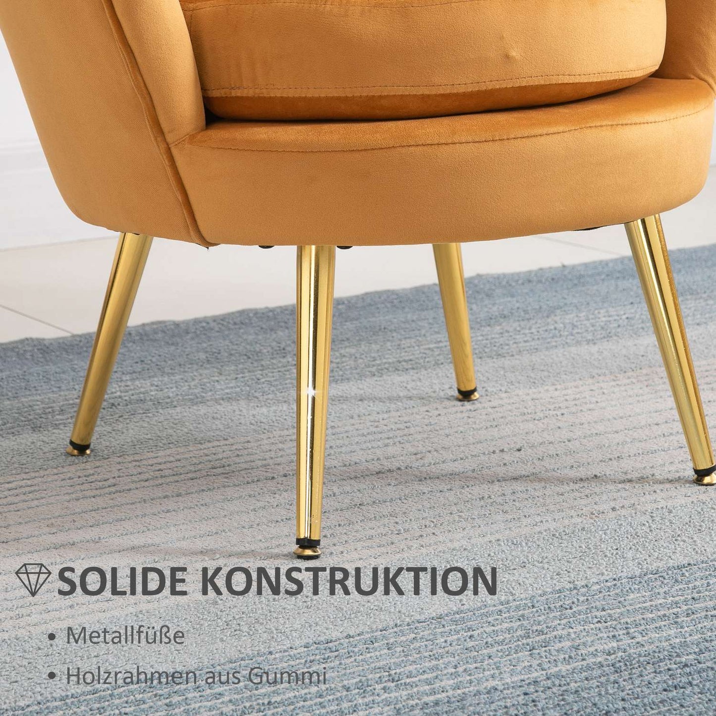 Upholstered shell-shaped armchair with metal legs, yellow