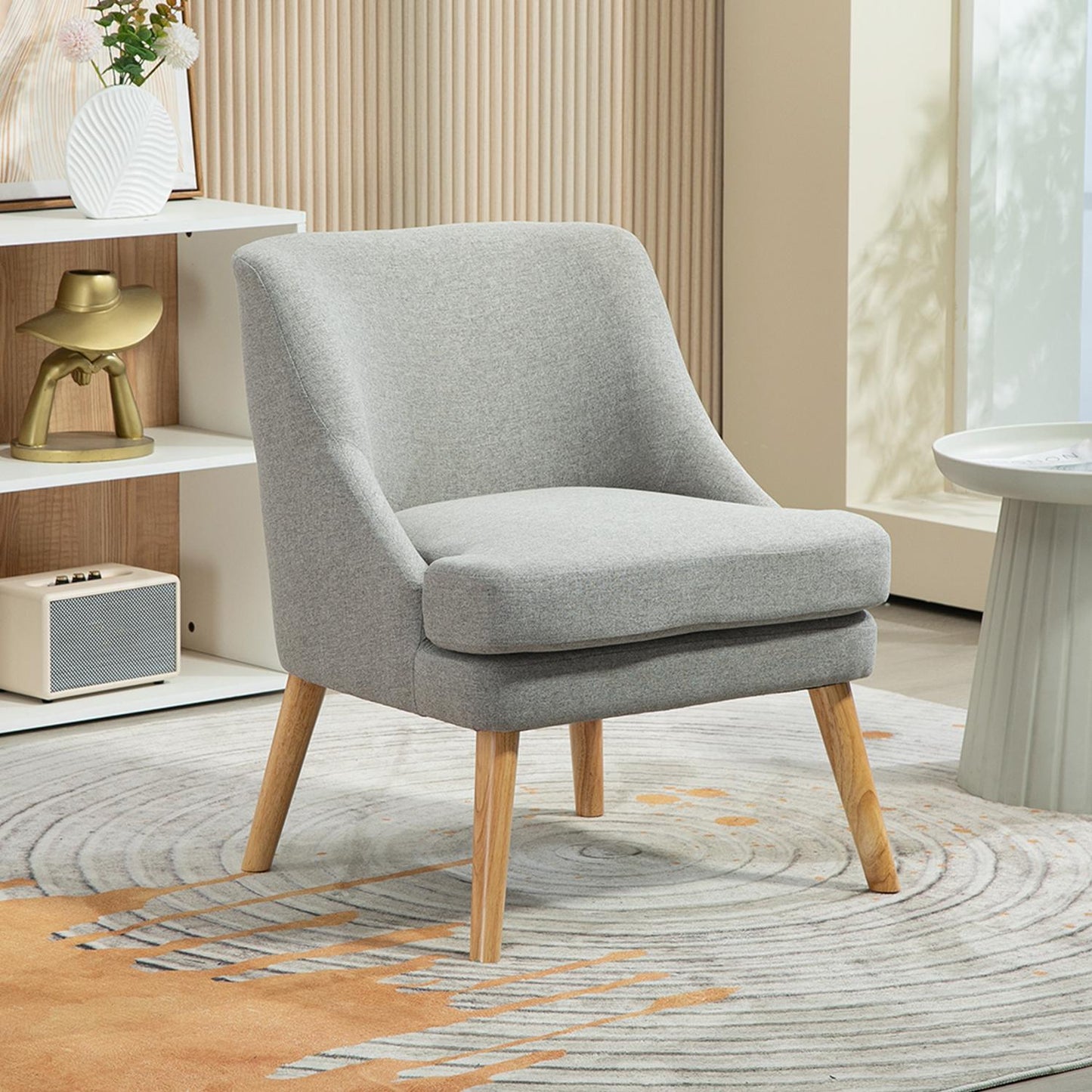 Light gray relaxation armchair in linen style with armrests