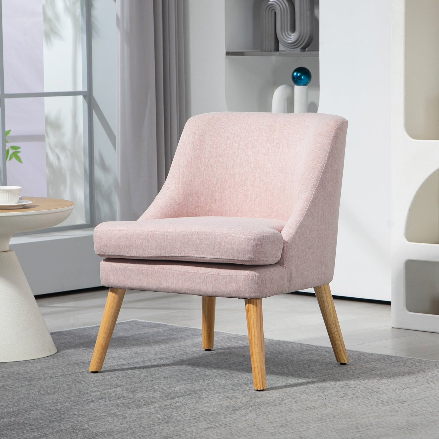 Pink lounge chair in linen look with armrests, wooden legs