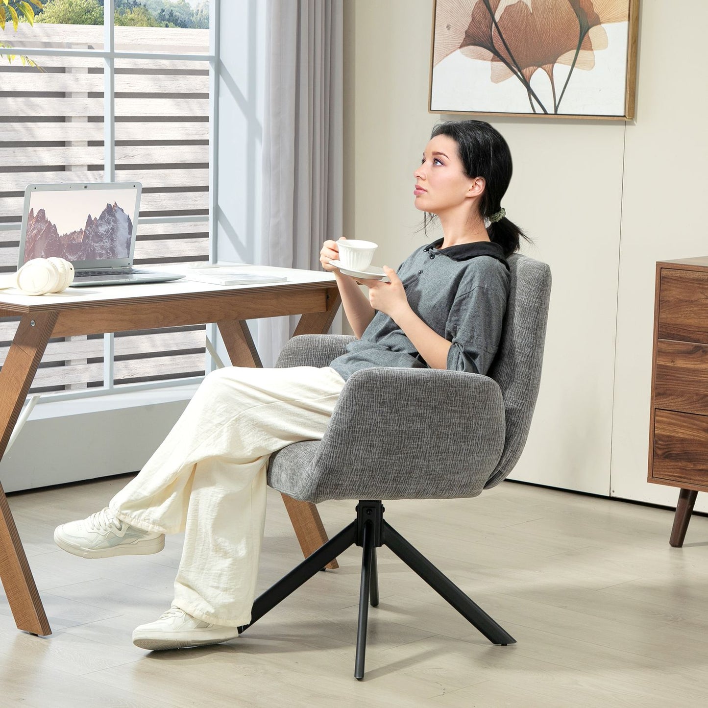 Dark gray swivel armchair - modern upholstery, steel legs