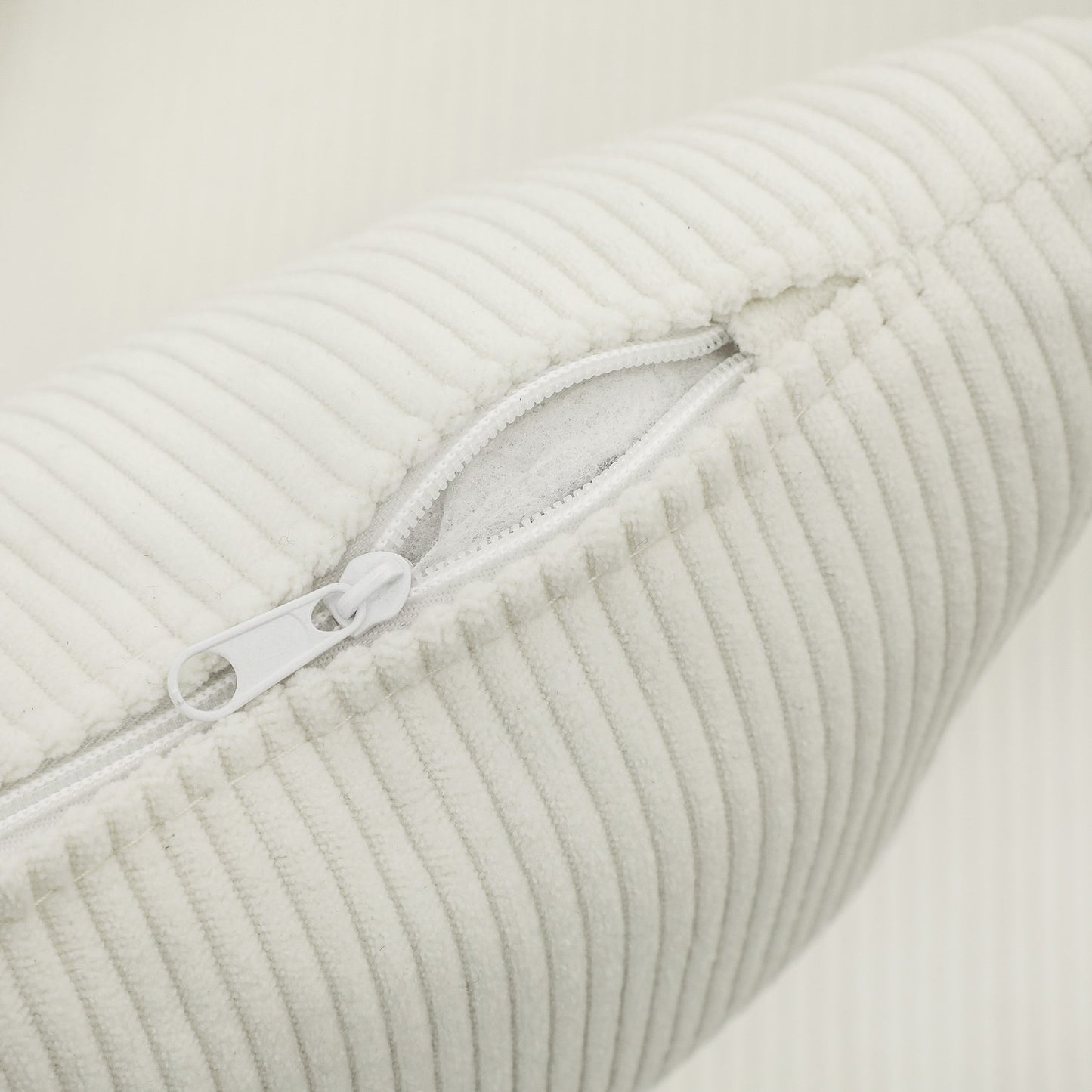 Creamy white upholstered armchair - wooden legs, cord look