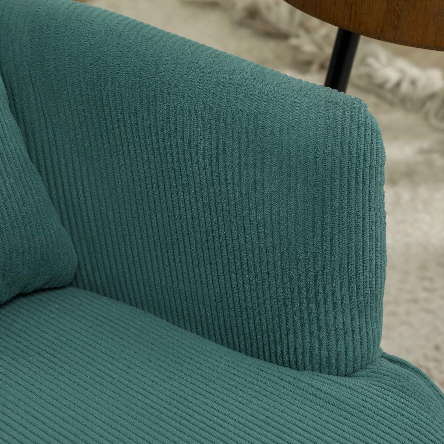 Dark green upholstered armchair, cord look, wooden legs