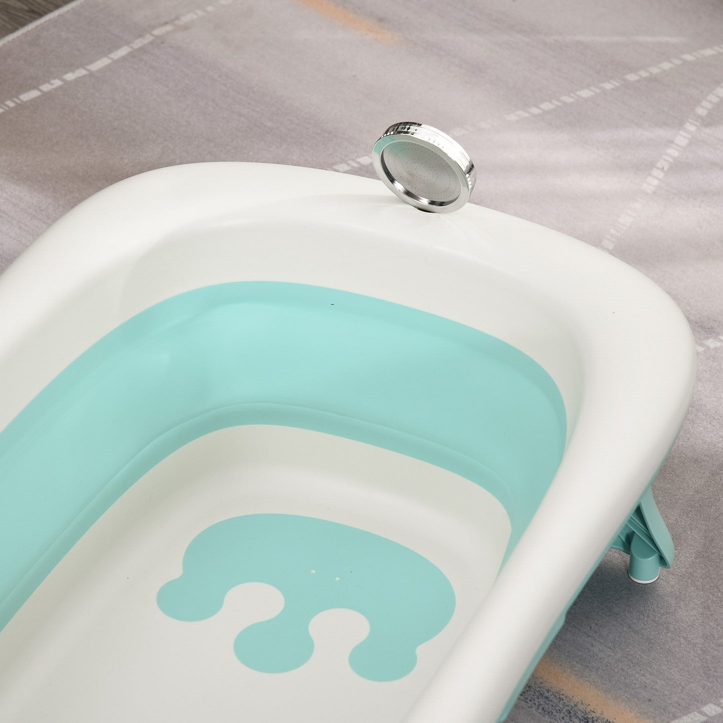Ergonomic foldable baby bathtub, green plastic, 84.5 cm