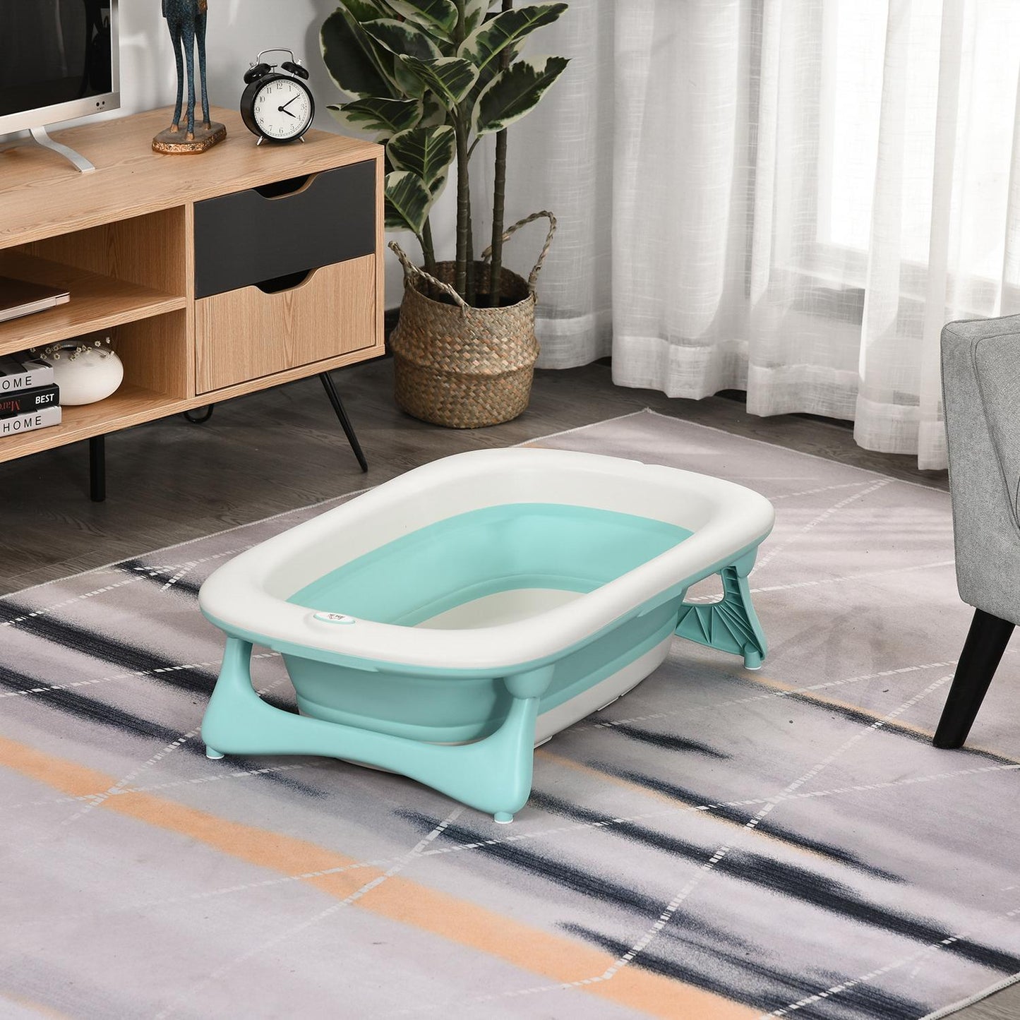 Ergonomic foldable baby bathtub, green plastic, 84.5 cm