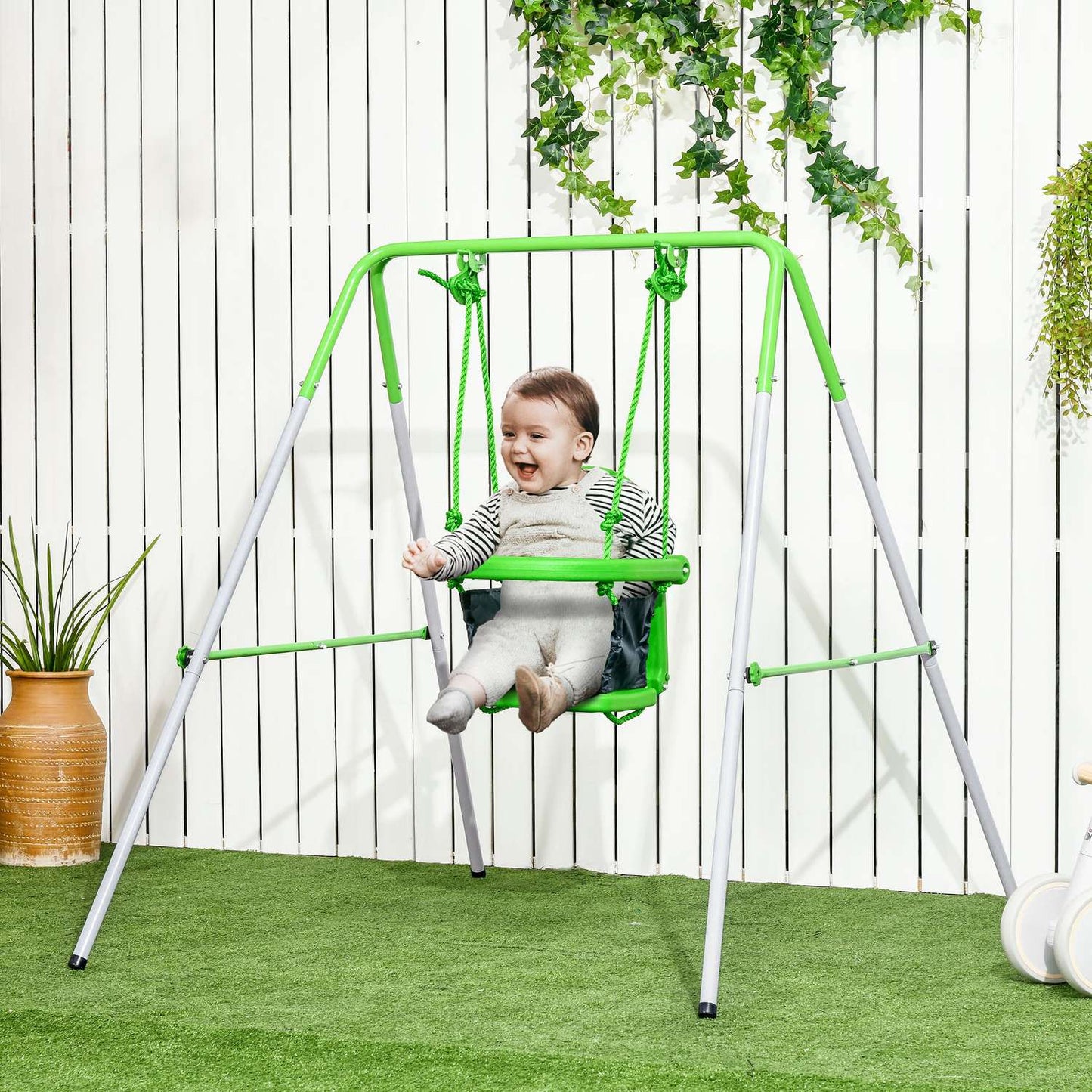 Garden swing for toddlers with safety bar and belt, green, 6-36 months