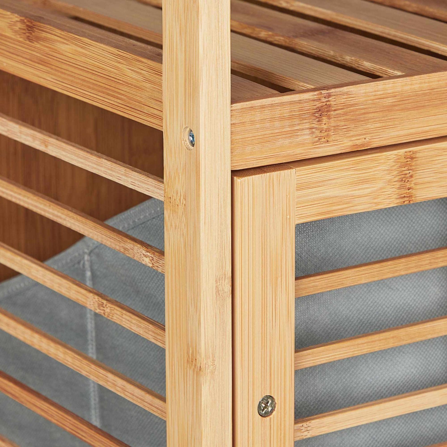 Bamboo bathroom shelf with laundry basket