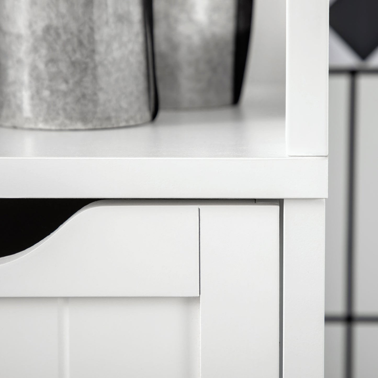 Tall white bathroom cabinet with drawers and shelves