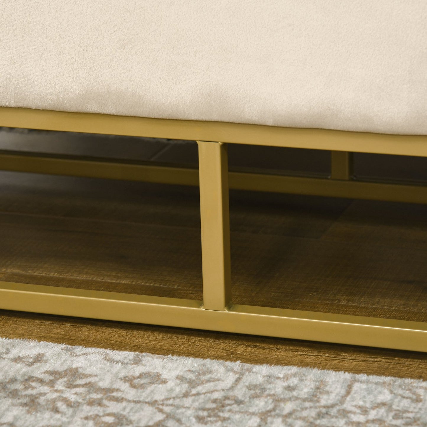 Beige upholstered storage bench with steel legs, 110cm