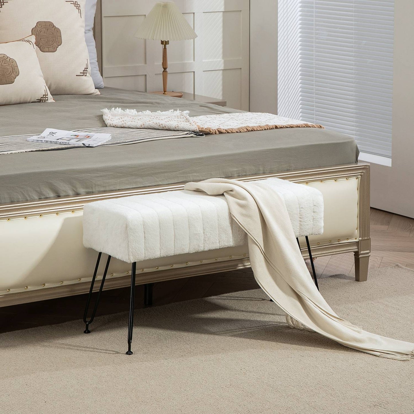 Upholstered cream bench with metal legs, faux fur look