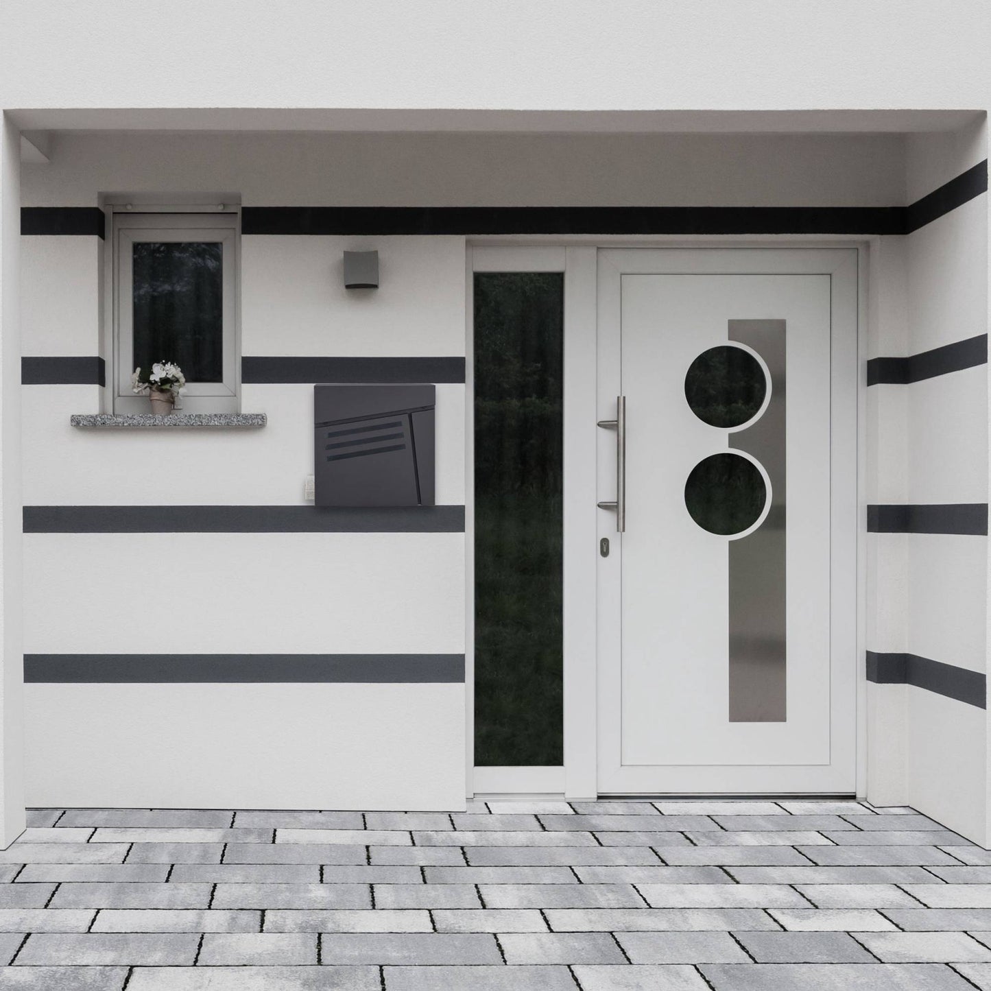 Black mailbox with newspaper holder