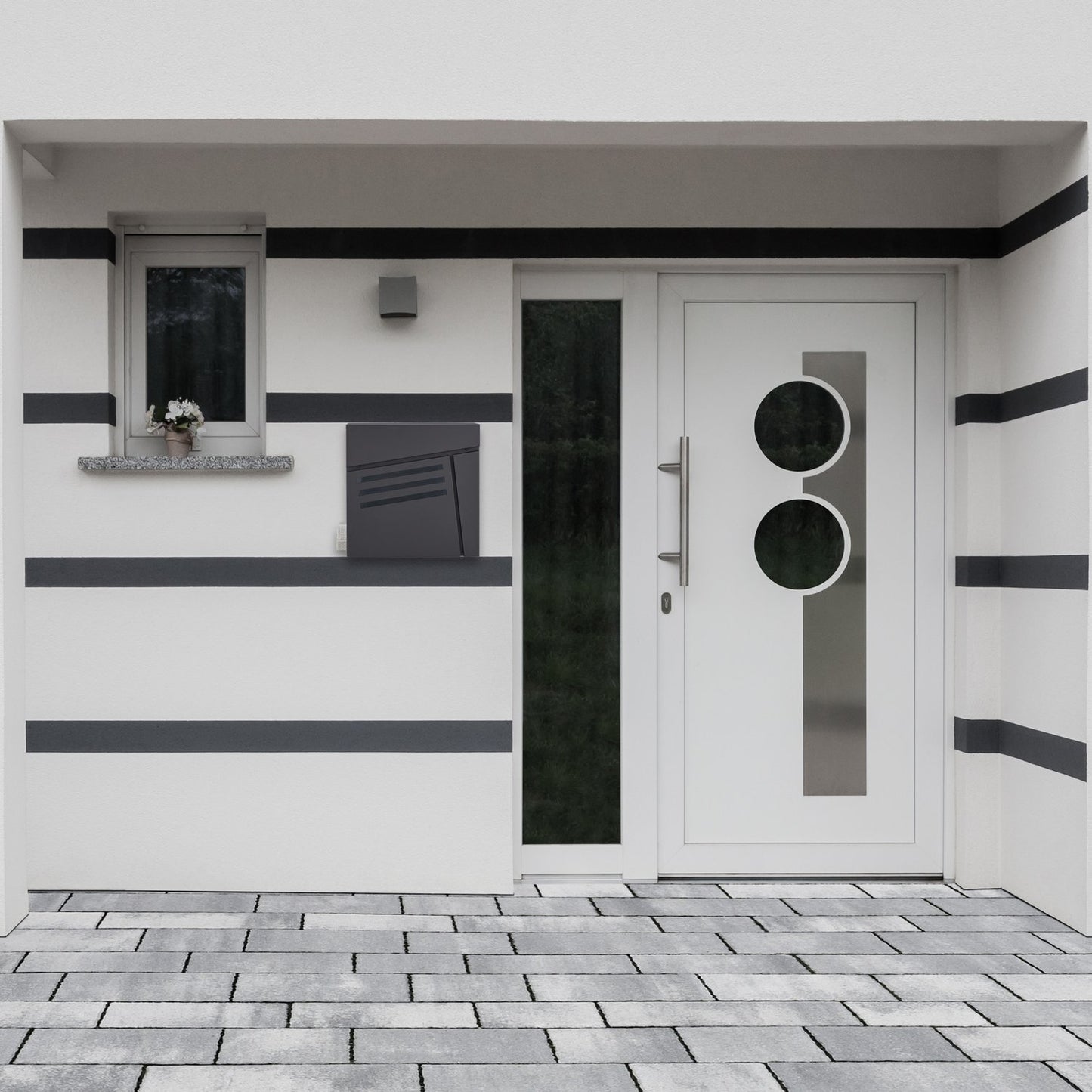 Black mailbox with newspaper holder