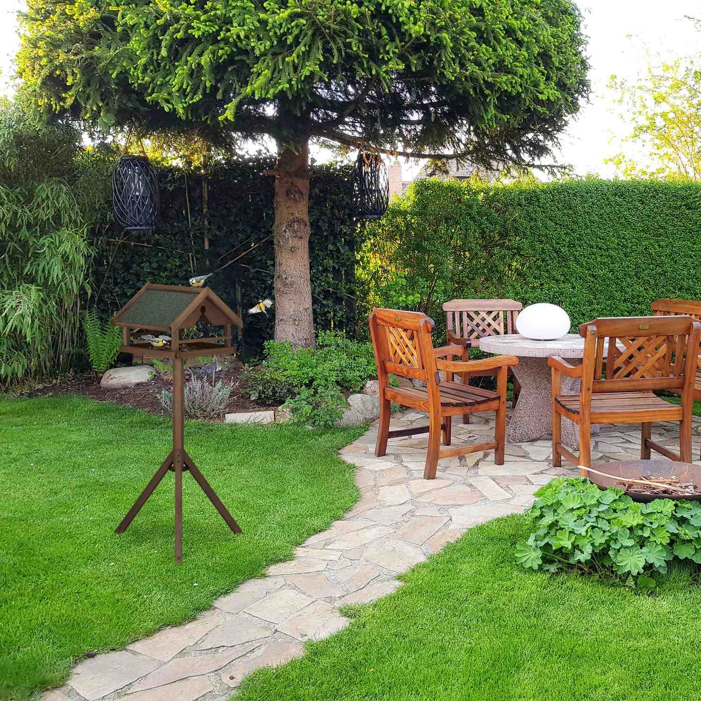 Brown bird table on pole
