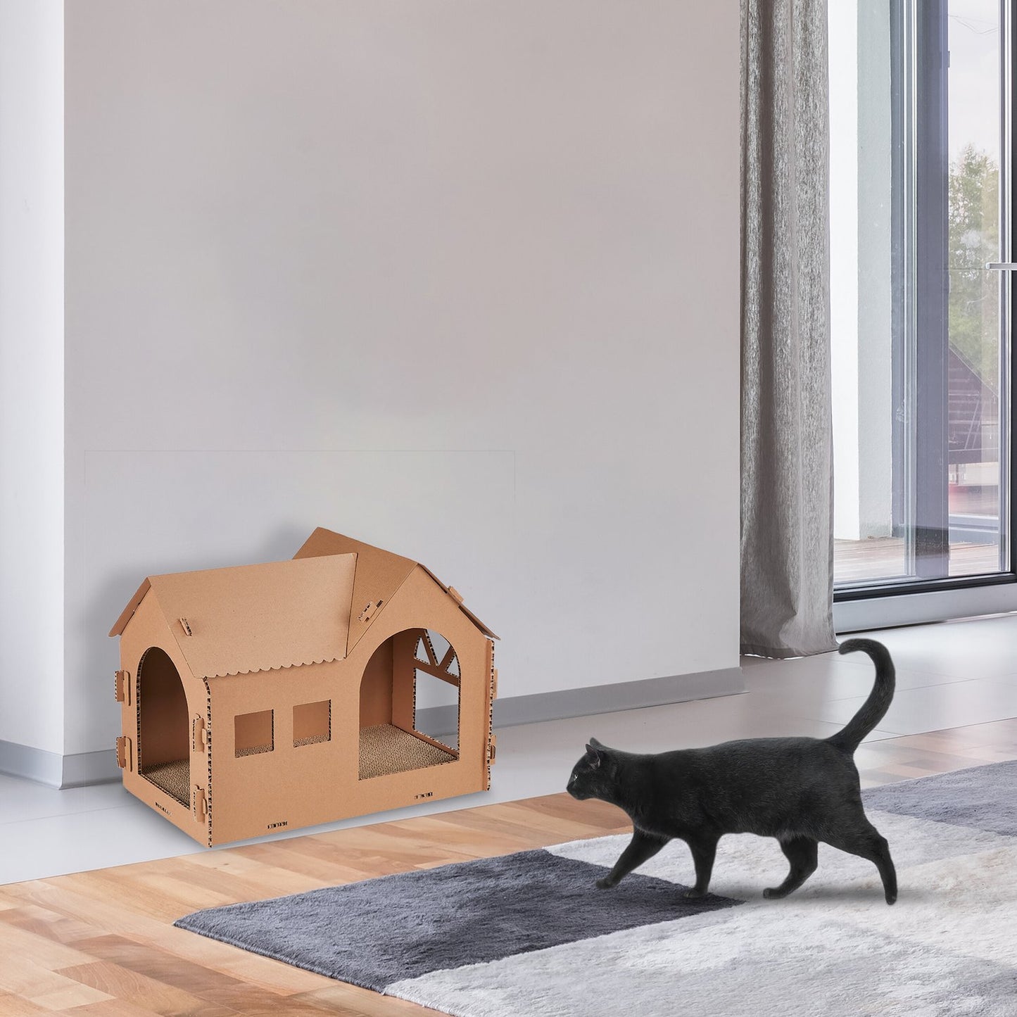 Cardboard cat house with scratching board